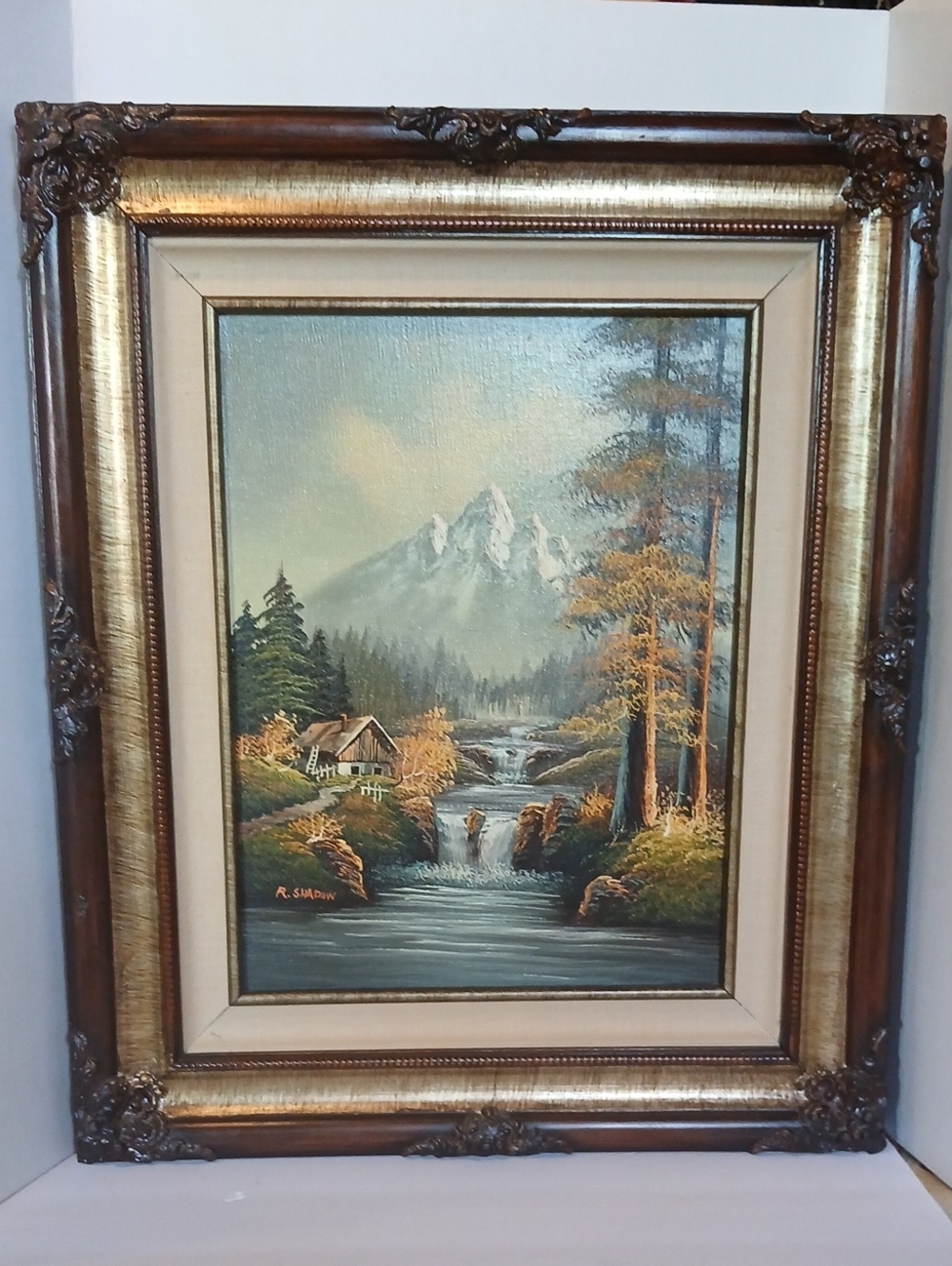 Mountain Stream Cabin Painting in Gold and Brown Frame
